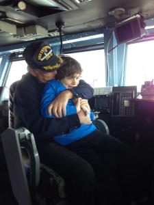 My father and younger son Eli saying goodbye to the USS Enterprise where he served.